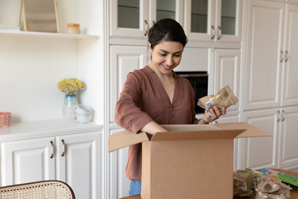 Person taking items out of a box