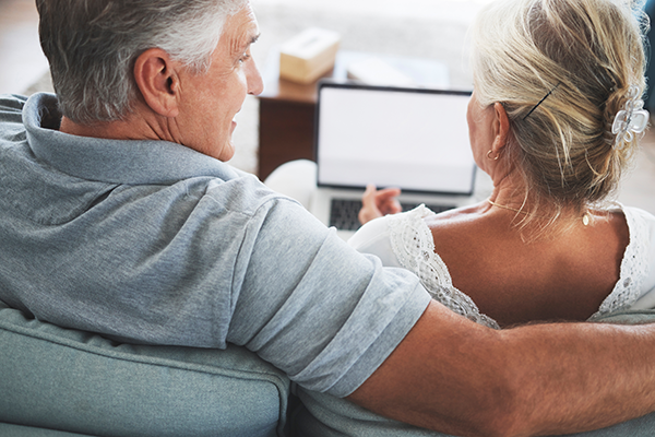 Couple looking at laptop