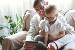 An older man with a baby